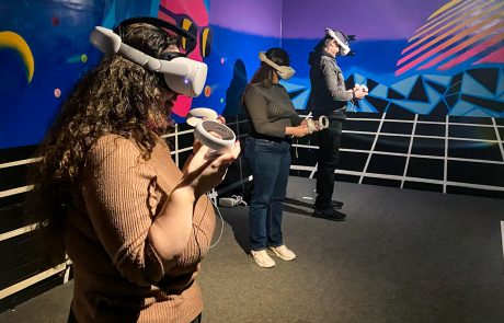 People playing VR arcade games
